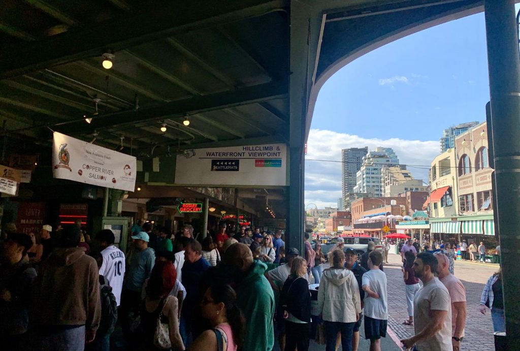 Wet market crowd in Pike Place Market in summer
