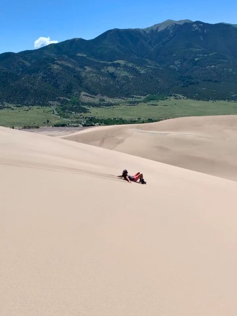 Sand sledding in Great Sand Dunes National Park