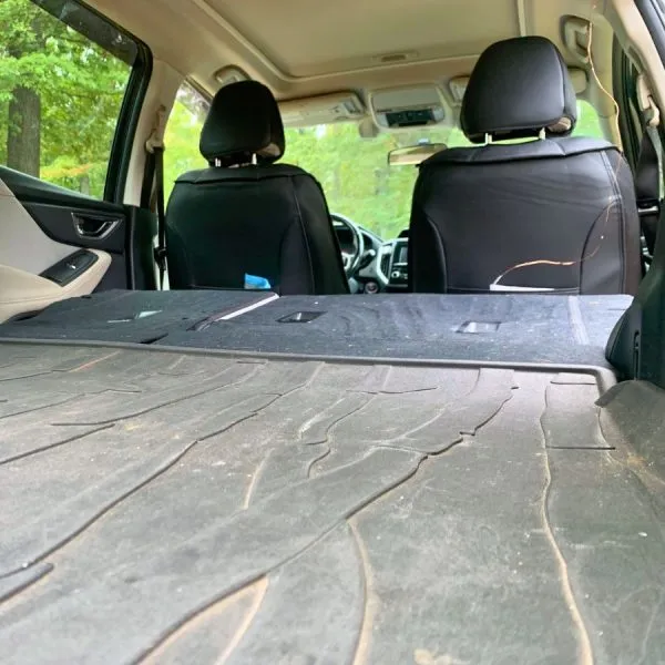 Back seat folded flat for car camping in Subaru Forester