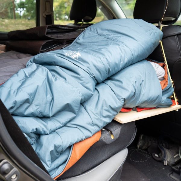 Folded car camping bed in an SUV
