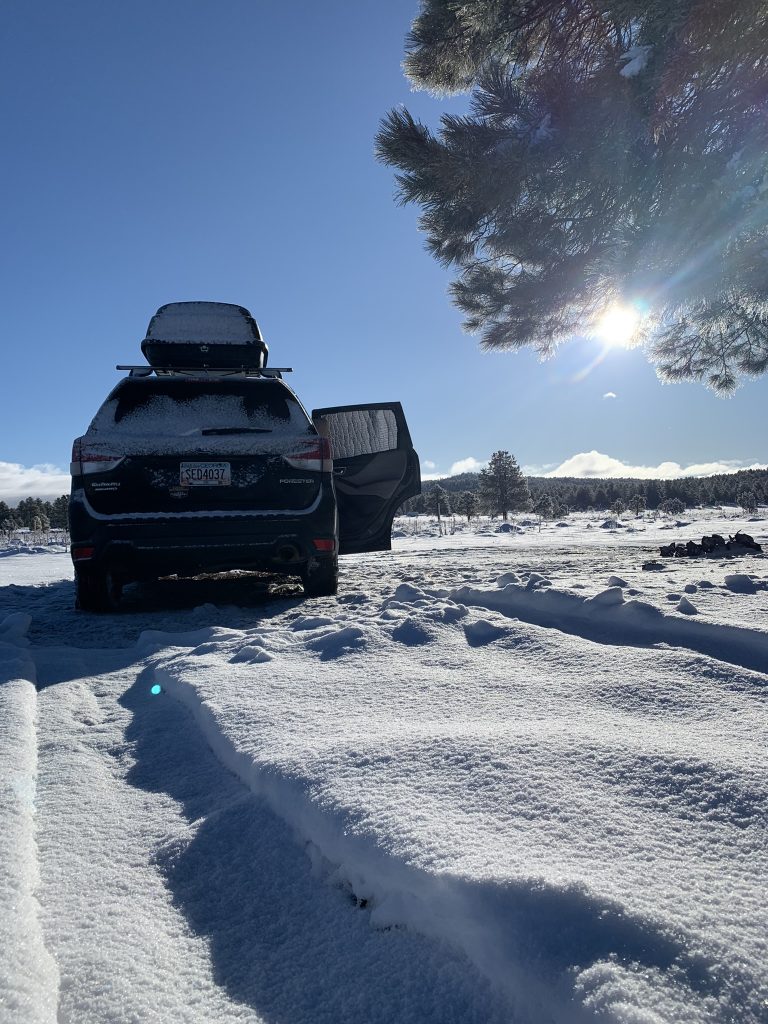Winter SUV camping in the snow