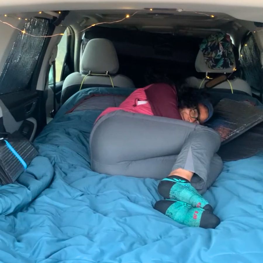 Sleeping in a car with window covers